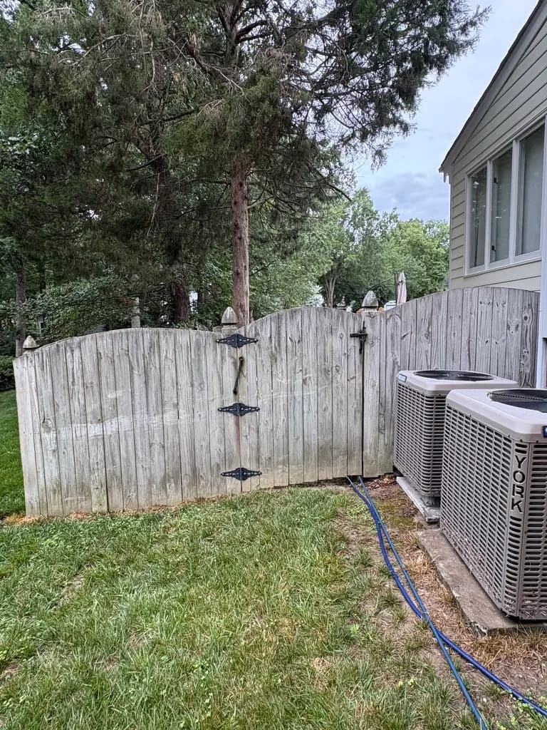 Before: wood fence cleaning with mildew and discoloration in Richmond VA