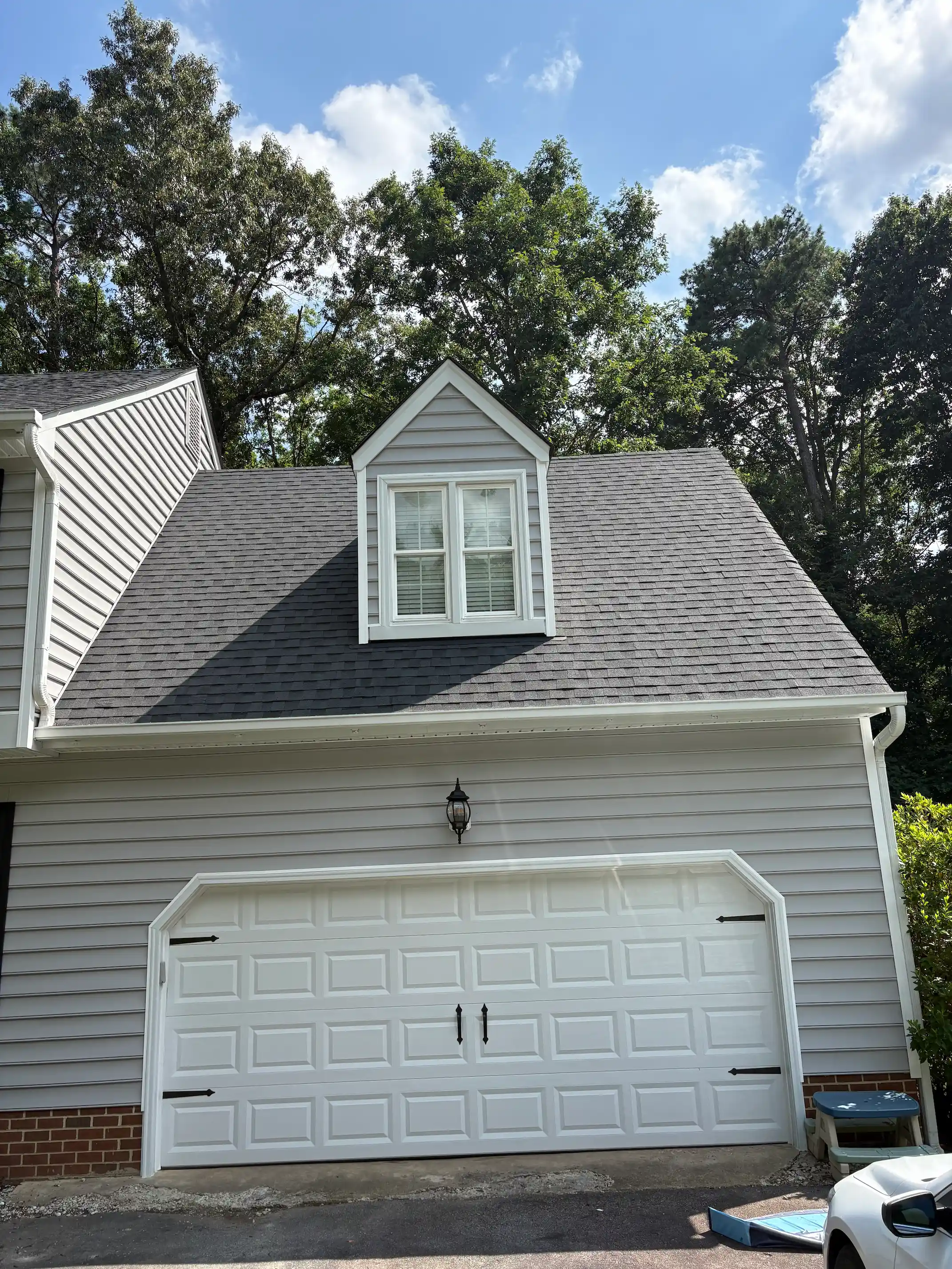 After: asphalt shingle roof soft washing with black streaks and algae in Richmond VA